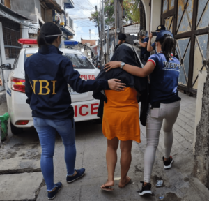 Rescue-in-Caloocan-City Arrested-suspect-led-out-of-compund. 