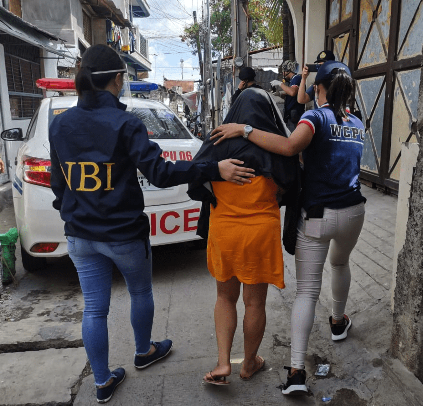 Rescue-in-Caloocan-City Arrested-suspect-led-out-of-compund.